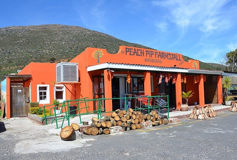 The iconic orange building of The Peach Pip Farm Stall